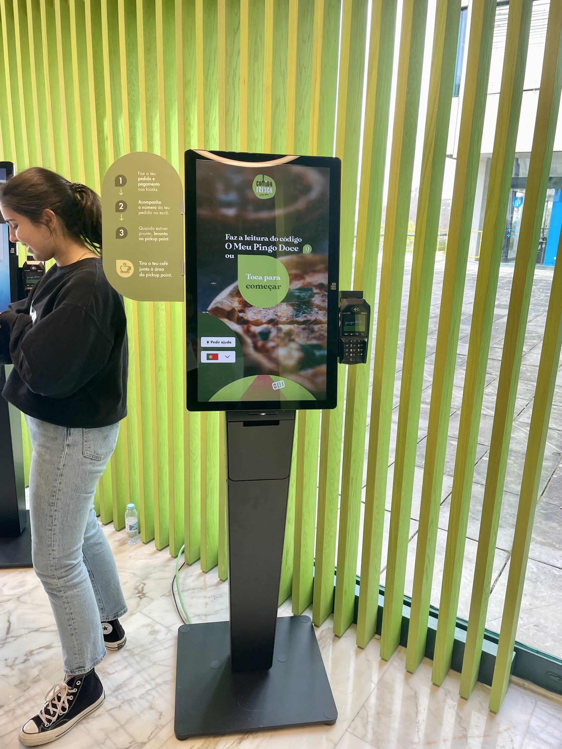 A customer at the kiosk on launch day